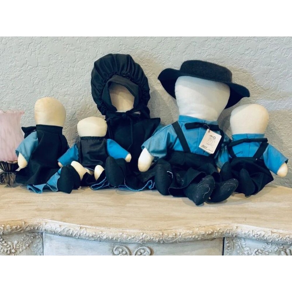 Family of five Hamish fabric dolls crafted by hand